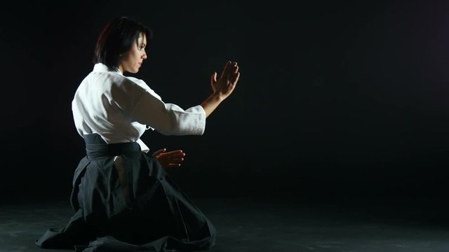  beautiful woman goes in for sports, aikido