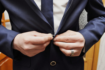 A man is dressing up 