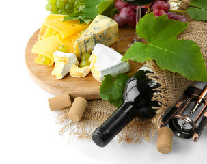 Red wine with grapes and cheese, isolated on white