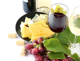 Red wine with grapes and cheese, isolated on white