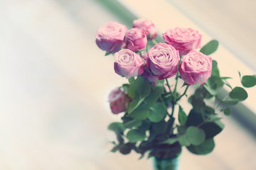 Fresh roses bouquet on windowsill