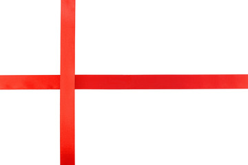 Obraz premium Crossed red ribbons on white background