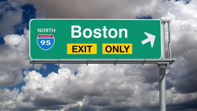 Boston Interstate 95 exit only sign with time lapse clouds.