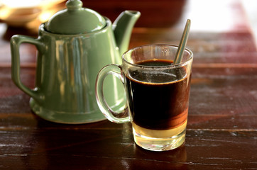Thai Hot Milk Tea, Cha-Ron  is a drink made from strongly brewed back tea, this Thai style hot-milk-tea served hot and filled sweetened condensed milk.
