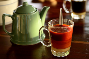 Thai Hot Milk Tea, Cha-Ron  is a drink made from strongly brewed back tea, this Thai style hot-milk-tea served hot and filled sweetened condensed milk.
