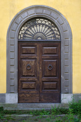 ancient wooden door of historic building
