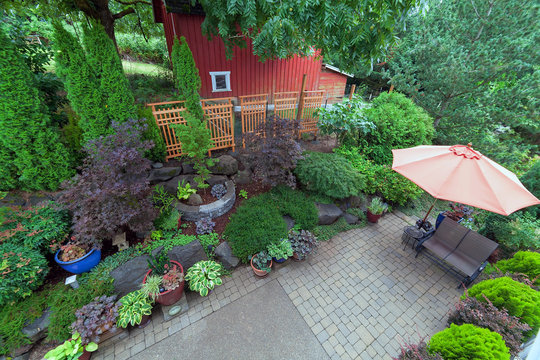 Backyard Patio Landscaping with Red Barn Overview