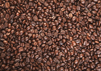Fototapeta premium Ziarna kawy w tle bliska zdjęcie