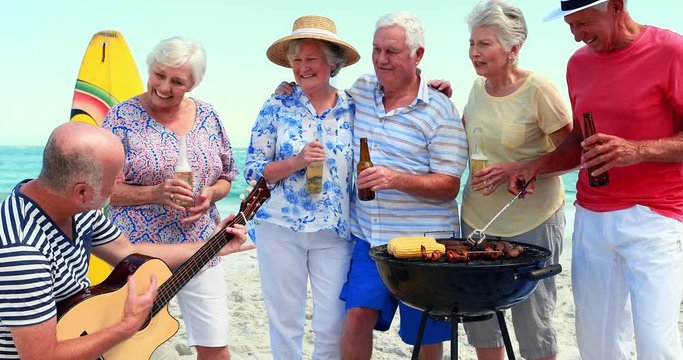 Senior friends having barbecue