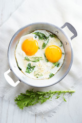 fried egg with green spinach