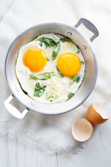 fried egg with green spinach
