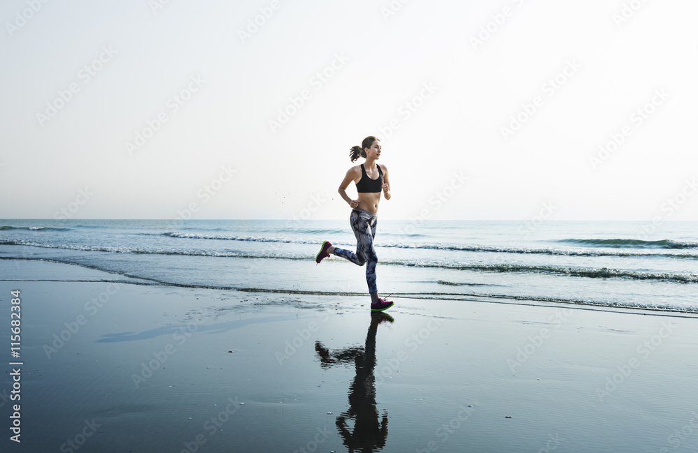 Wall mural Running Exercise Training Healthy Lifestyle Beach Concept