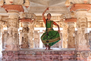 kuchipudi is one of the classical dance forms of india,from the state of andhra pradesh.here the dancer performing at bhoganadeeswara temple near bangalore,famous for sculptures © fotomagic
