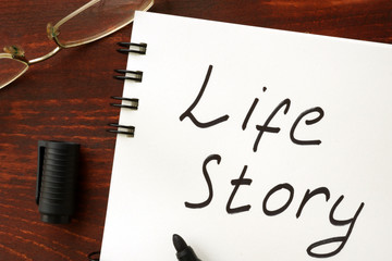 Life story sign written in a notepad.