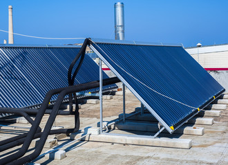 Vacuum solar cells for water heating system on the pool roof