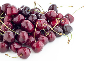 Cherries on white background