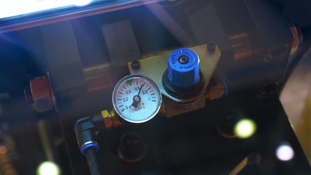 Gauge indicate surges of pressure in the system of industrial equipment