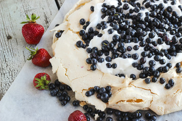 Meringue cake Pavlova with blueberry