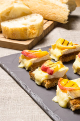 canapes with grilled brie and nectarine