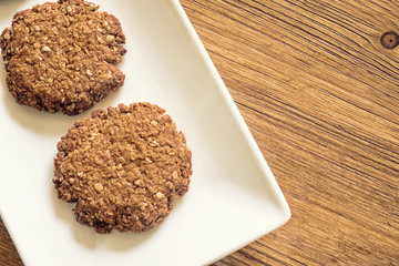 Oatmeal cookies on a wooden table