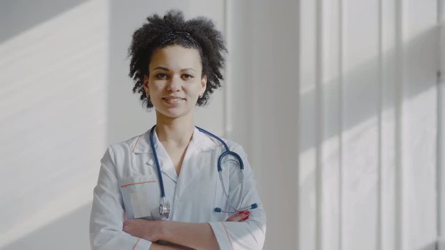 Healthcare, medical: Portrait of woman doctor with stethoscope in a hospital