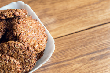 Oatmeal cookies on a wooden table