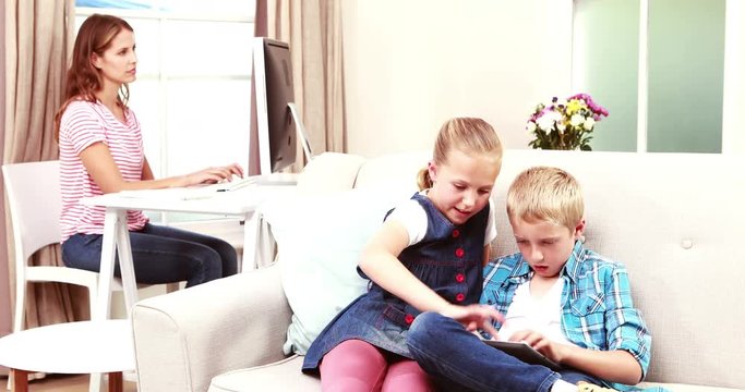 Kids playing games of the couch