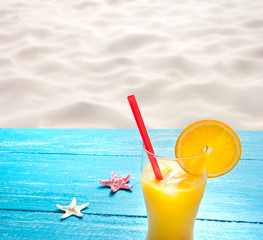 orange juice at the beach