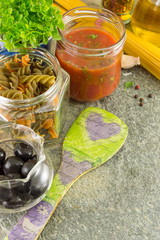 Pasta making ingredients on a stone table