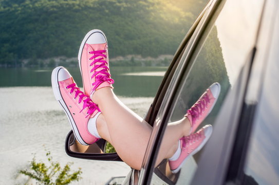 Legs Out Of The Car Window By The Lake