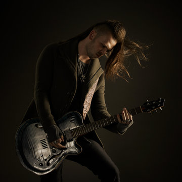 Guitarist playing rock music.