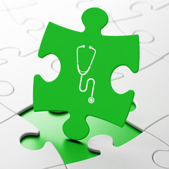 Medicine concept: Stethoscope on puzzle background