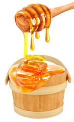 honey dripping in a bucket isolated 