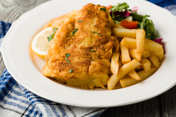 Fried cod with chips.