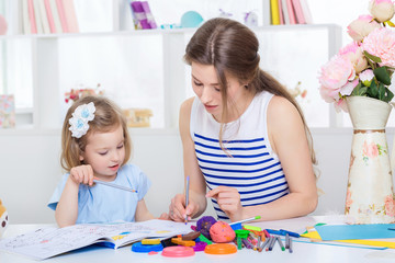 Fototapeta premium mom and daughter together