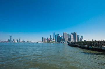 Fototapeta na wymiar ニューヨーク、マンハッタンとジャージーシティー　/ ニューヨーク、ガバナーズアイランドよりマンハッタンとジャージーシティーを眺めます