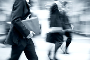 Fototapeta premium group of business people in the street and blue tonality