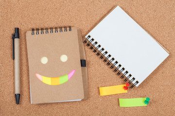 book note on cork board