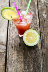 watermelon juice on wooden background