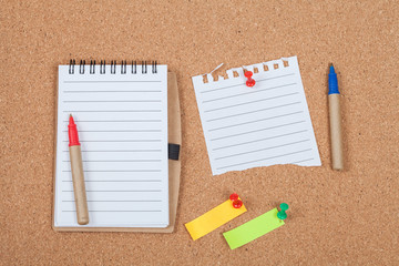 book note on cork board