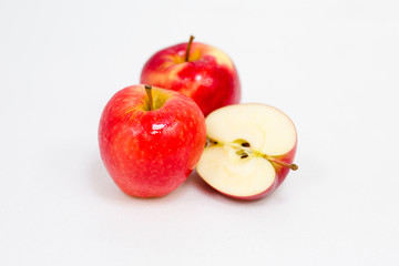 Red apple slice on a white background.