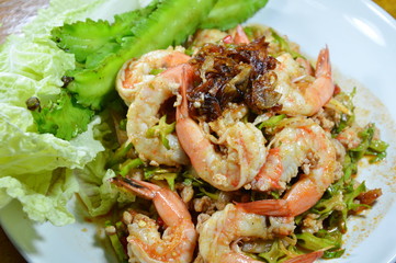 spicy shrimp and wing bean salad eat with fresh vegetable on dish