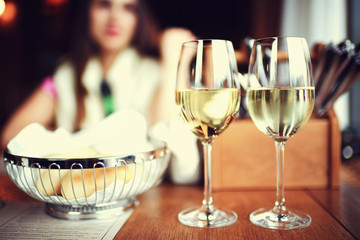 restaurant serving wine woman
