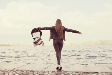 woman on autumn walk in the city