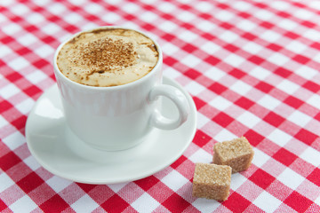 Black coffee in a white porcelain cup