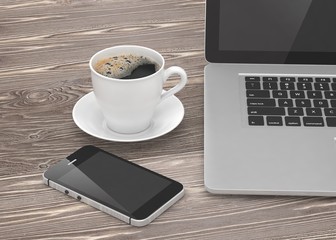 Fototapeta na wymiar Laptop smartphone and coffee cup on wood table. 3d rendering.