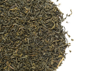 Organic Green Tea (Camellia sinensis) dried long leaves. Macro close up background texture. Top view.