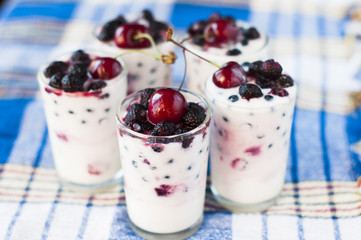 homemade yogurt with cherries and blackberries