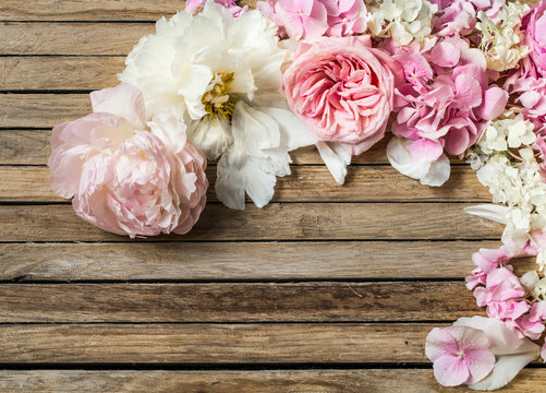 beautiful flowers on wooden background, various , place for text, closeup