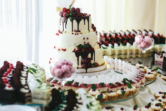 Stunning Wedding Cake Decorated With Black Chocolate And Grape S